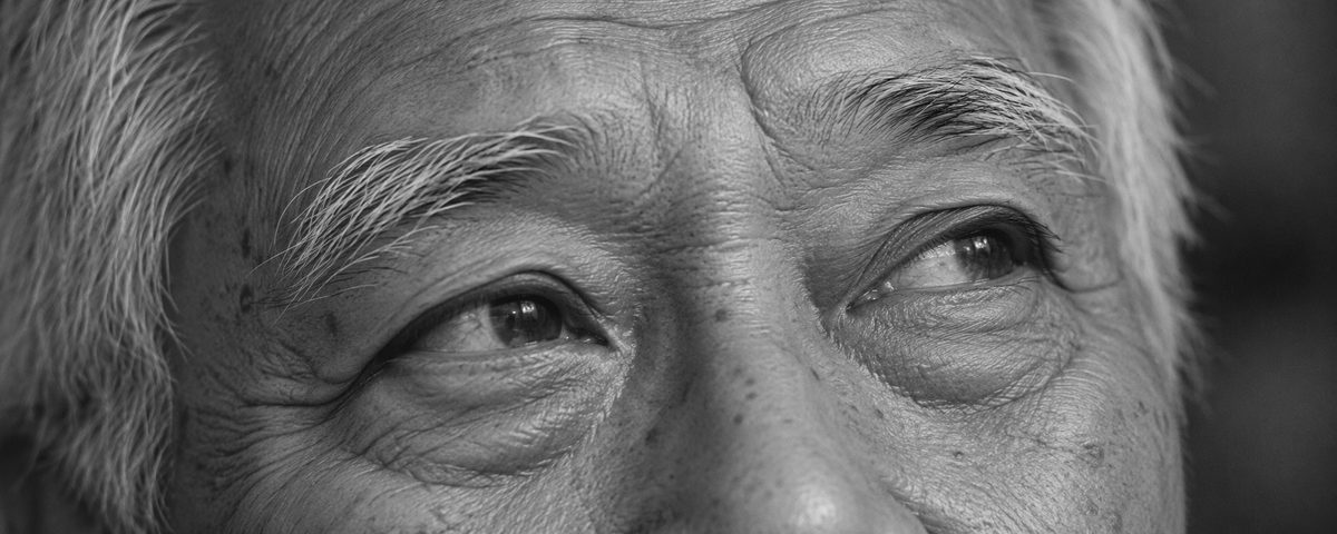 An older man's eyes, looking to the side