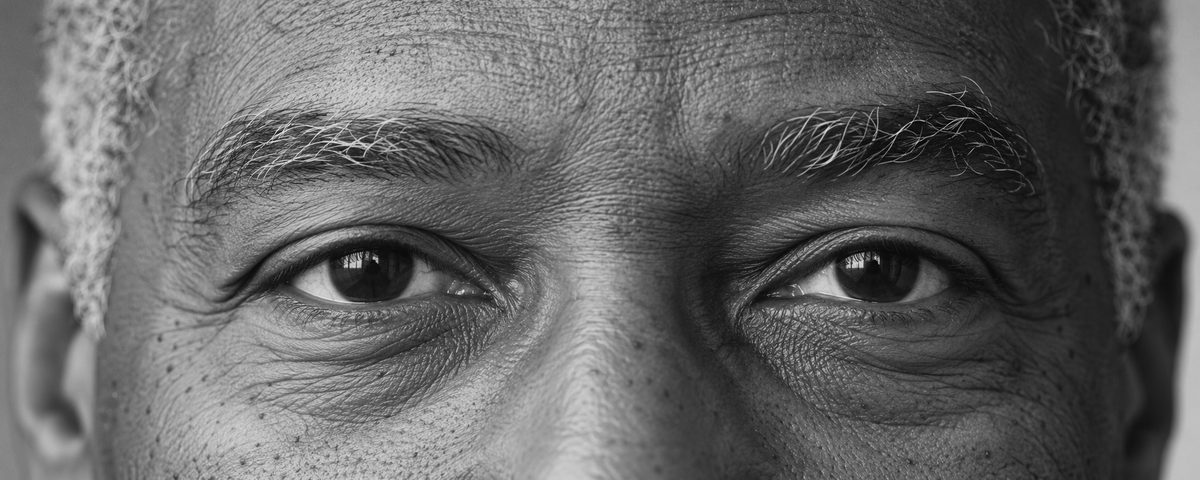An older man's eyes, looking straight at the camera